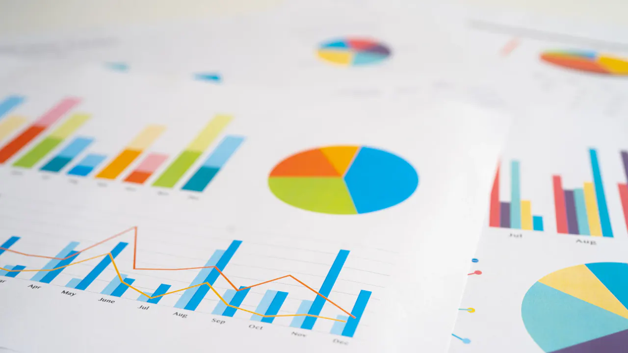 Printed sales charts and graphs, illustrating key sales statistics for 2021