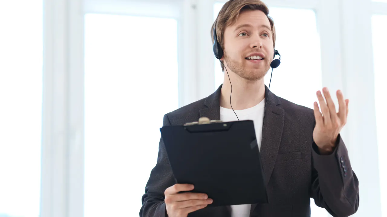 Sales rep with headset and clipboard giving a cold call pitch, illustrating cold calling tips and script templates