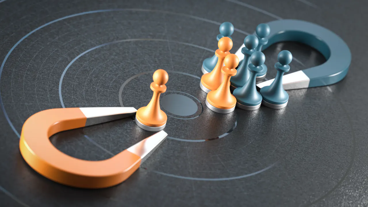 Magnets attracting chess pawns, illustrating inbound vs. outbound sales balance
