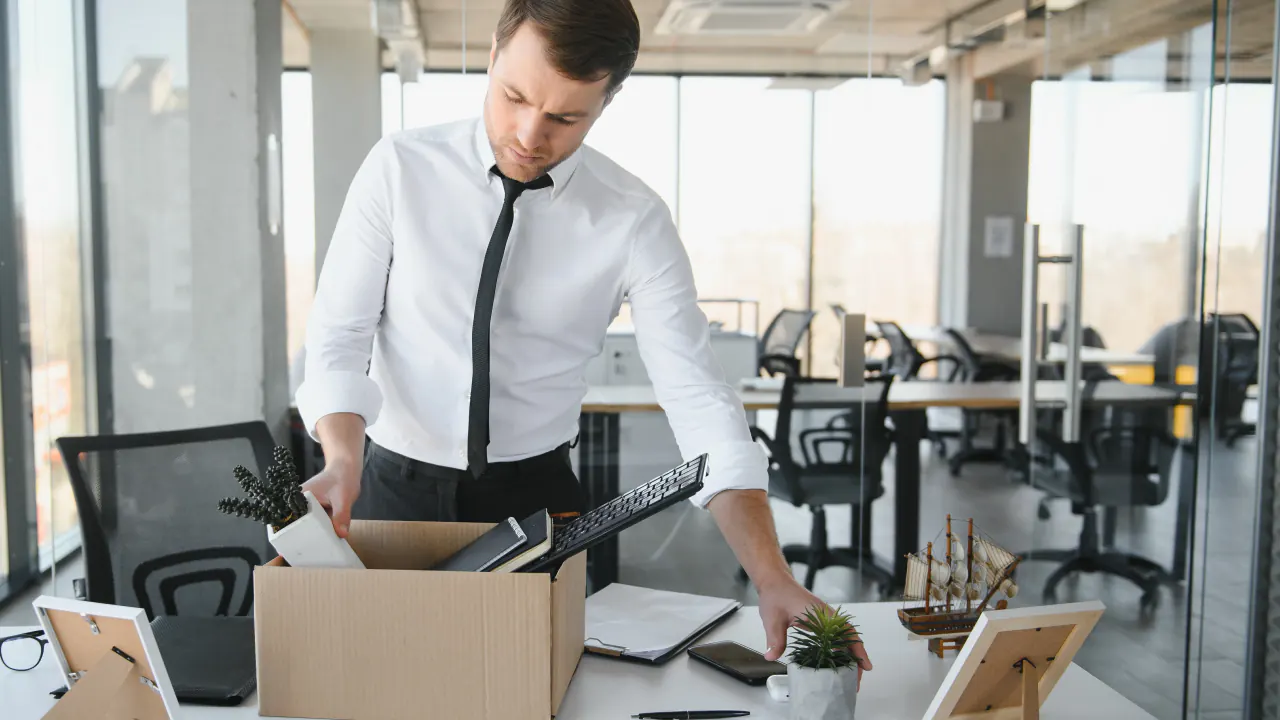 Businessman setting up a new office desk, illustrating how to start a lead generation business