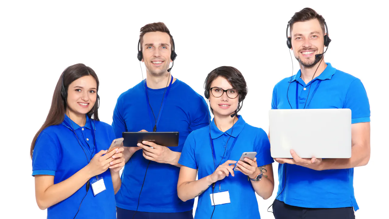 Four smiling lead generation agents in blue shirts with headsets, illustrating lead generation services